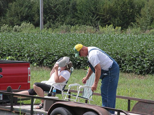 A welding helmet offers some eye protection during the total solar eclipse that crossed southeast Nebraska in 2017. However, double-check the shade number to make sure you have the best protection for April 8's eclipse. (DTN photo by Elaine Shein)