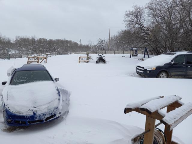 In some areas of Saskatchewan that had heavy snow warnings this week, the two-day snowfall brought back winter, leading to roads and yards snowed in and school buses unable to get rural students to school. (Photos courtesy of Lorna Wertypora)