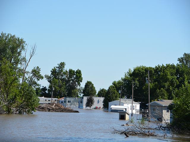 A trailer park flooded along the Missouri River last month in Iowa. Rural communities face a lot of challenges trying to recover from extreme weather events. Iowa officials estimate rural communities suffered more than $130 million in damage to public infrastructure from the storms. (DTN photo by Chris Clayton)