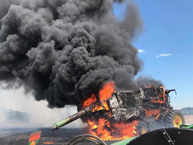 Warm, dry, windy harvest conditions combined with crop dust and chaff accumulating on hot surfaces can increase the risk of combine and other machinery fires. This fall has already seen some combine fires in the U.S. and Canada. (File photo courtesy of Kindred, North Dakota, Fire Department)