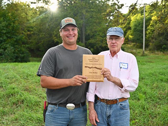 Tim Kelley, right, of Elmo, Missouri, was recognized for his commitment to conservation and creating opportunities for his tenant, Brent Nold of Savannah, Missouri. (Photo courtesy of Practical Farmers of Iowa)