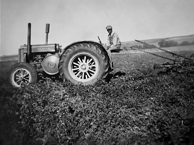 Hired man Henry plows with a 1935 John Deere D on the John B. "Jack" Quinn farm east of Elkhorn, Nebraska, in the spring of 1951. The D has been in the Quinn family for nearly 90 years. (DTN photo by Russ Quinn)