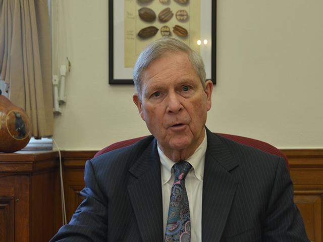 Outgoing Agriculture Secretary Tom Vilsack in an interview at his office earlier this month. Vilsack said Congress often looks for budget cuts but has blocked USDA from closing any local Farm Service Agency (FSA) offices even when they are not staffed. Members of Congress also complained about cutting crop and livestock surveys this year even after Congress cut the statistical agency's budget. (DTN photo by Chris Clayton)