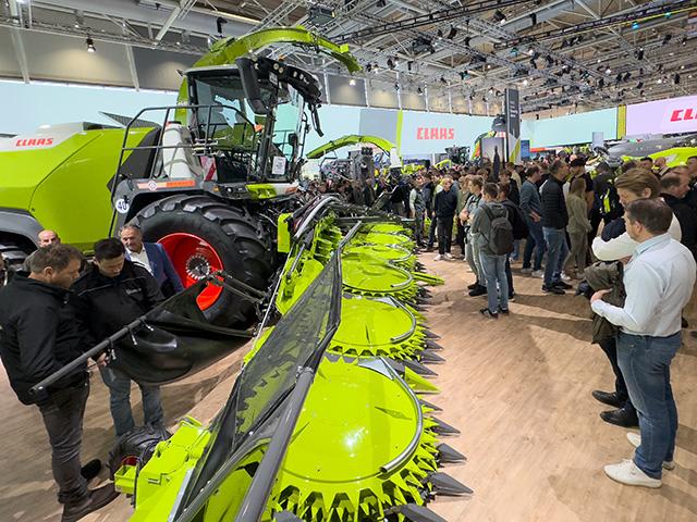 Fans gather around the Claas 1000-series Jaguar forage harvester at the 2025 Agritechnica machinery show in Hanover, Germany. The biennial show attracts huge crowds to see hundreds of companies showing off their latest equipment. (DTN photo by Joel Reichenberger)
