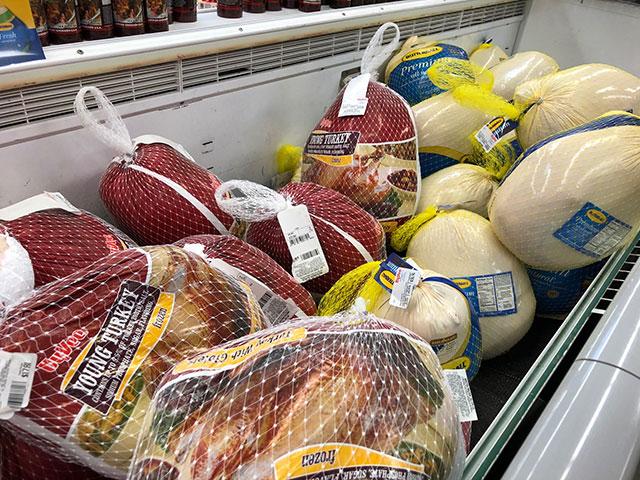 Turkeys at a grocery store in Omaha. The American Farm Bureau Federation shows a 16% decline in turkey prices for its annual survey of Thanksgiving meal costs. An overall Thanksgiving meal is about 5% cheaper than last year, unless other certain items are included such as ham. (DTN file photo by Elaine Shein)