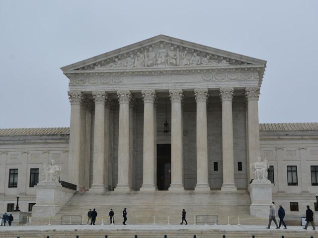 President Donald Trump made it clear on Friday he would push other buttons in federal law to impose tariffs on other countries after the U.S. Supreme Court ruled 6-3 against Trump's use of the International Emergency Economic Powers Act. Trump has used a tariff strategy to reduce the trade deficit and increase revenue from those duties. (DTN photo by Chris Clayton)