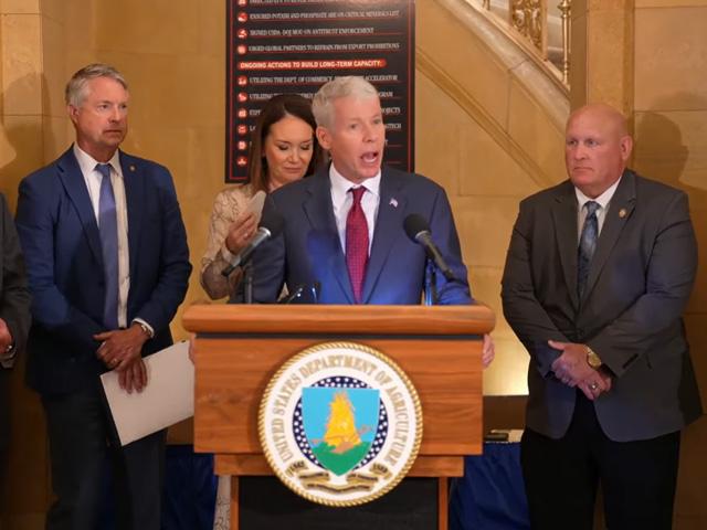 Energy Secretary Chris Wright speaks at a USDA press conference focused on fertilizer with Agriculture Secretary Brooke Rollins. Wright and Rollins said fertilizer projects have been burdened by permit requirements and the Biden administration’s focus on climate initiatives. Wright is flanked by Sen. Roger Marshall, R-Kansas, left, and House Agriculture Committee Chairman Glenn “GT” Thompson, R-Pa. (image from USDA livestream)