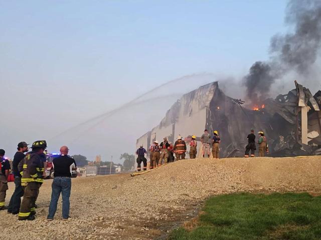 Emergency crews respond to the fire July 28, 2026, at the Agri Star Meat & Poultry processing plant in Postville, Iowa. (Photo by Dina Hackley Taylor)