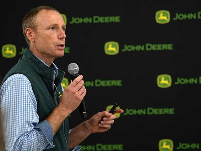 Jahmy Hindman, John Deere senior vice president and chief technology officer, speaks on Monday at the introduction press conference for Deere's "JD" AI assistant. (DTN/Progressive Farmer photo by Joel Reichenberger)